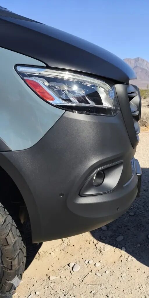 Matte-black reconditioned Sprinter front trim after Cerakote reconditioning