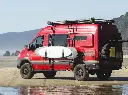 sprinter-van-surfboards-on-side (1).webp